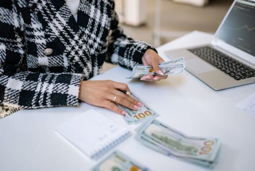 person counting cash